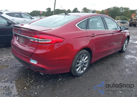 2018 Ford Fusion Energi Titanium from USA, damaged, VIN 3FA6P0SU8JR142660